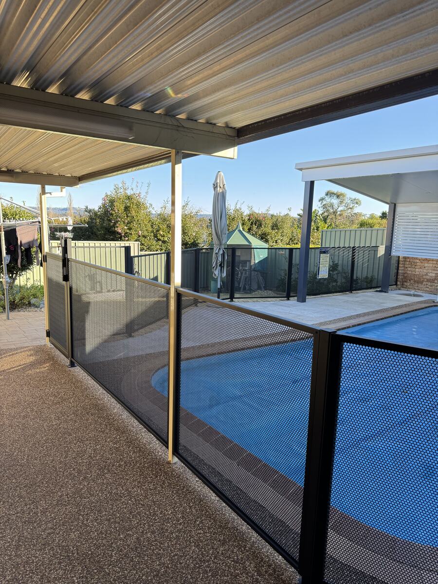 Pure Perf pool fence in Textured Black under an alfresco, Sydney