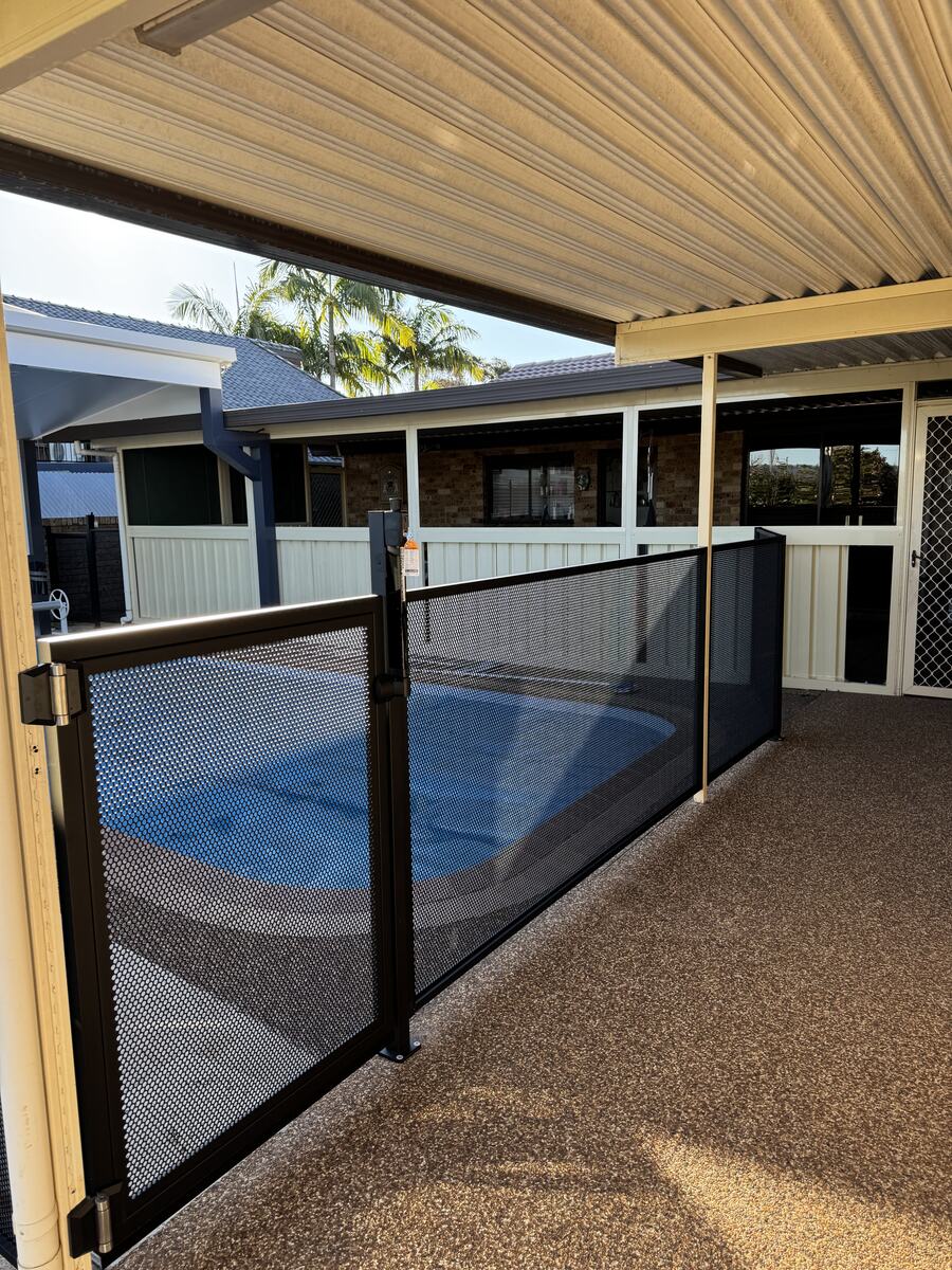 Pure Perf pool fencing along a pool under a pergola, Sydney