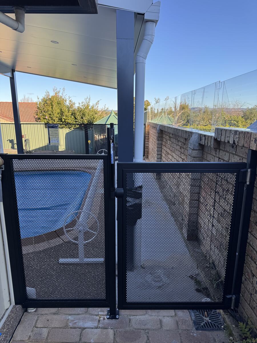 Pure Perf pool gate in Textured Black on sandstone, Sydney