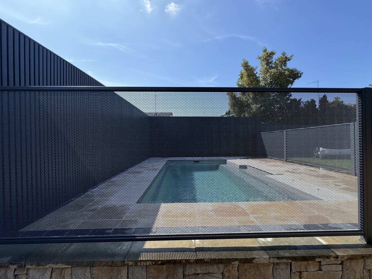 Pure Perf Textured Ironstone fencing around a plunge pool, Sydney