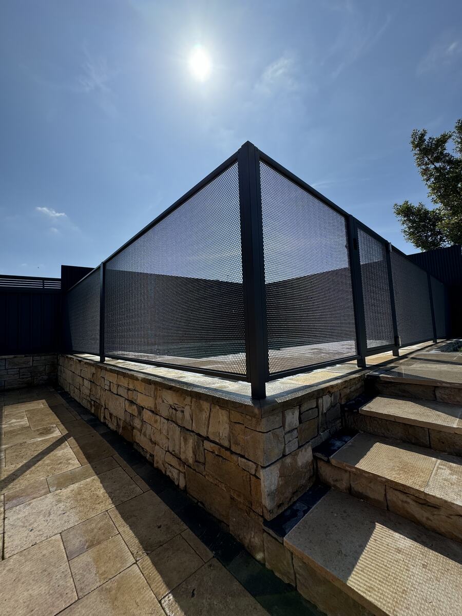 Pure Perf corner panel in Textured Ironstone on sandstone steps, Sydney