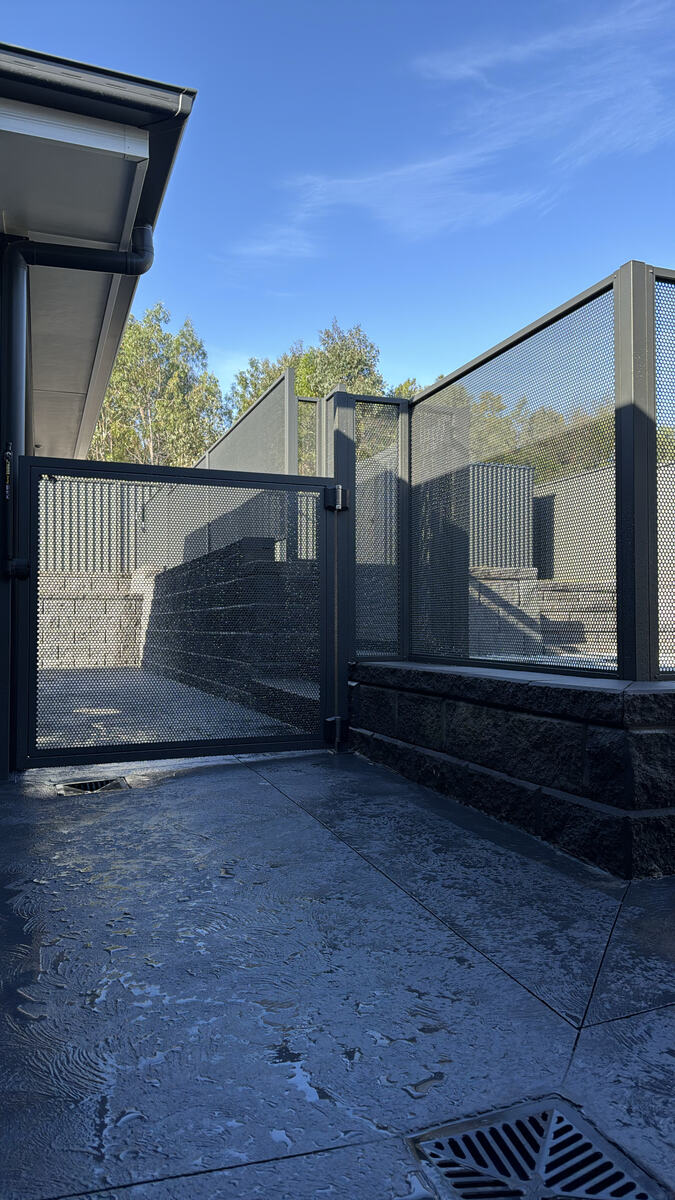 Pure Perf fencing in Textured Monument on stone paving, Sydney