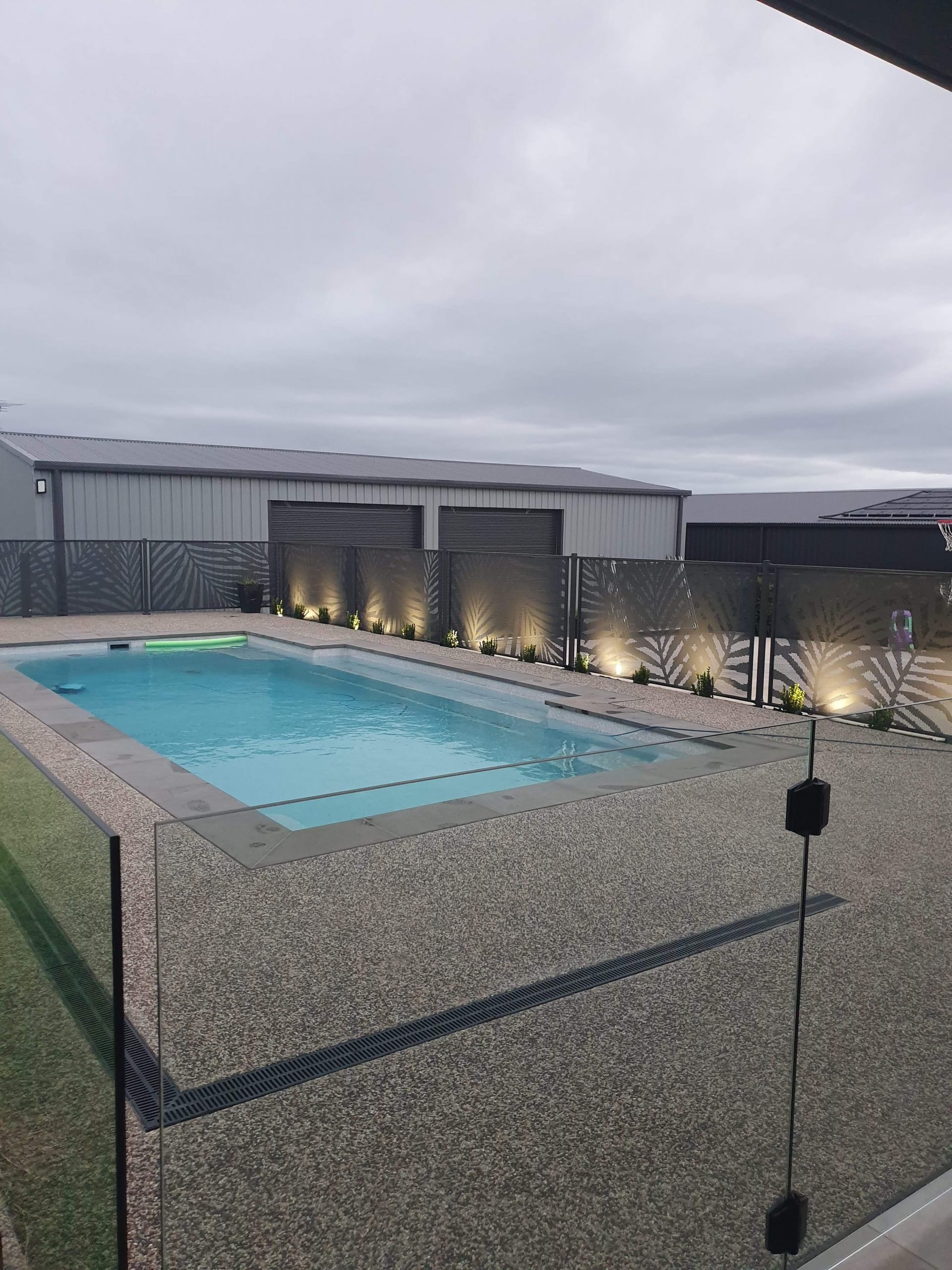 Palmy design fencing in Textured Monument with lighting, Victoria